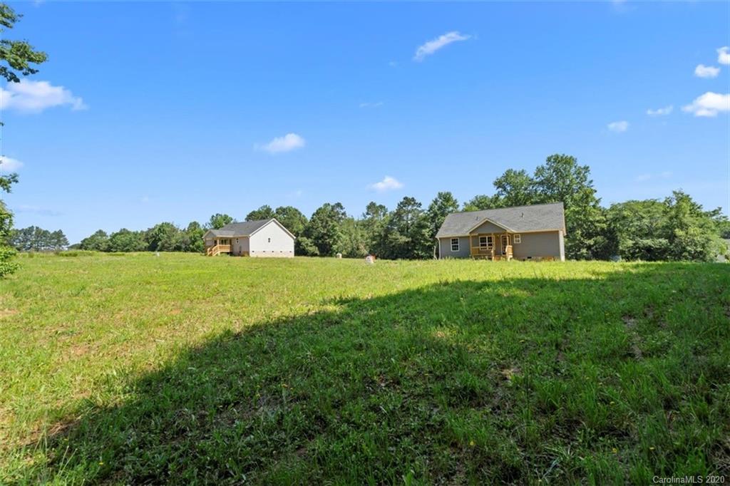 2979 Greenleaf Road, Unit 5 Clover, SC 29710 - Photo 41 of 46 a view of a garden with trees