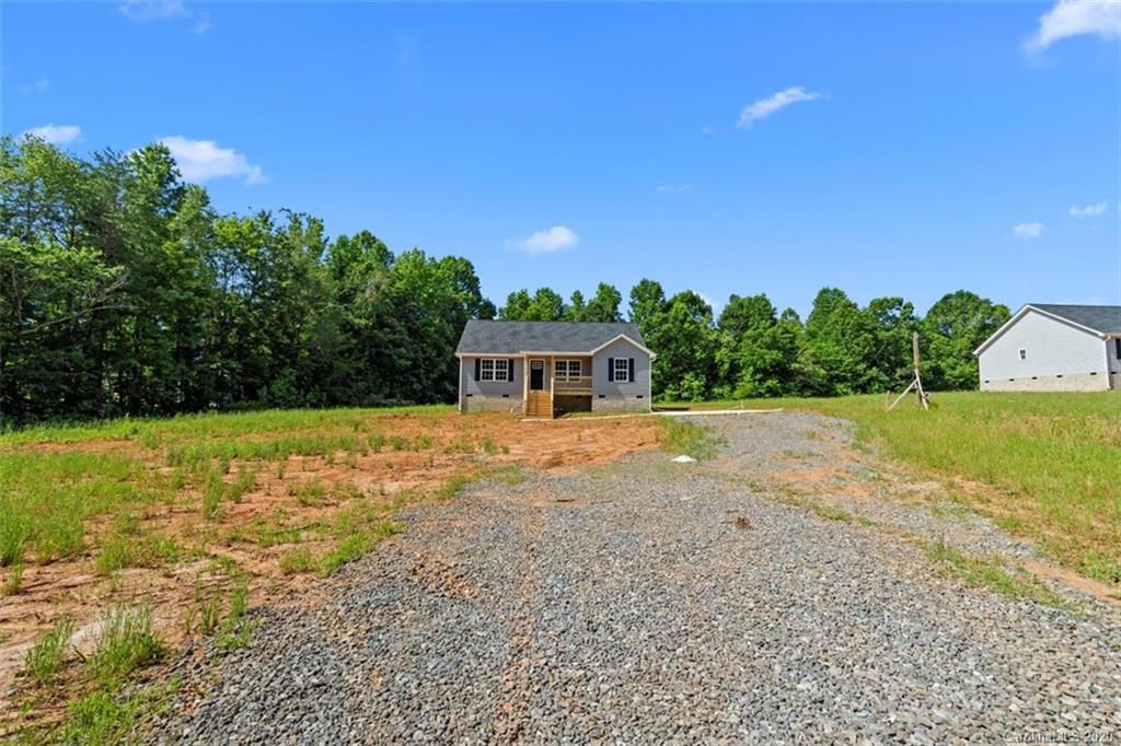 2979 Greenleaf Road, Unit 5 Clover, SC 29710 - Photo 45 of 46 a front view of a house with a yard