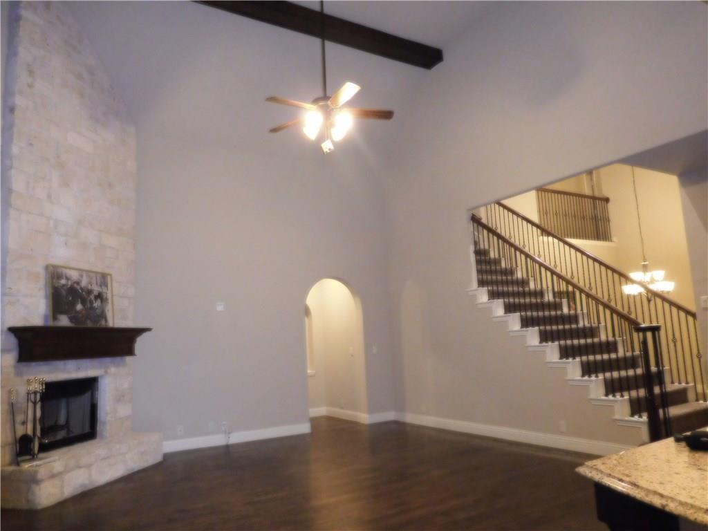 961 Crystal Falls Drive Prosper, TX 75078 - Photo 14 of 33 a view of entryway and hall with wooden floor