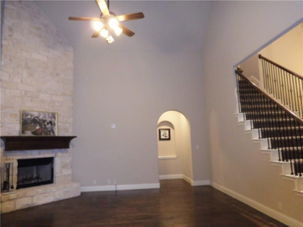 961 Crystal Falls Drive Prosper, TX 75078 - Photo 15 of 33 a view of empty room with wooden floor and fan