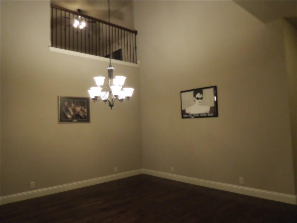 961 Crystal Falls Drive Prosper, TX 75078 - Photo 17 of 33 a bathroom with a light fixture and a chandelier fan
