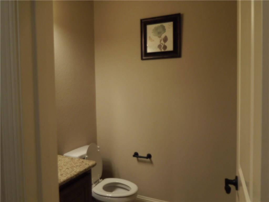961 Crystal Falls Drive Prosper, TX 75078 - Photo 18 of 33 a bathroom with a toilet