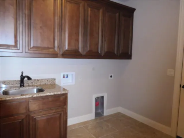 a view of a entryway door of the house and living room