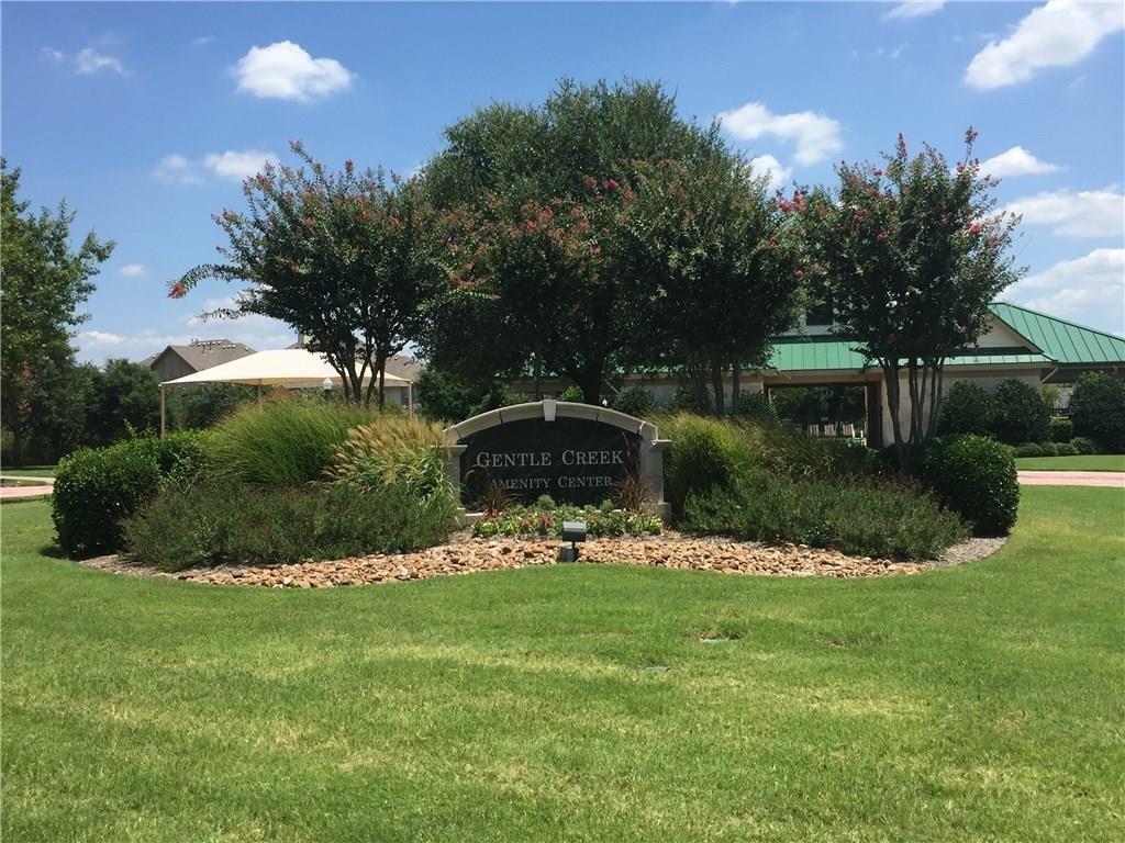 961 Crystal Falls Drive Prosper, TX 75078 - Photo 32 of 33 a backyard of a house with lots of green space
