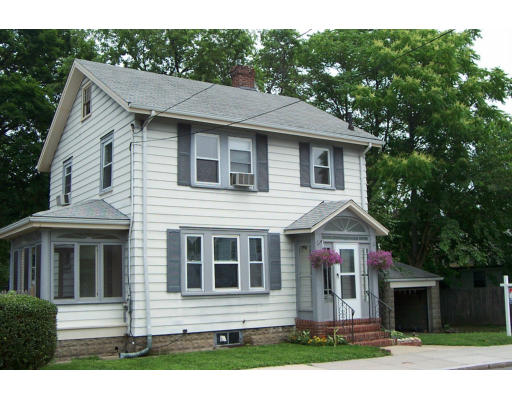 10 Rumford Road Boston, MA 02132 - Photo 1 of 1 a front view of a house with a yard