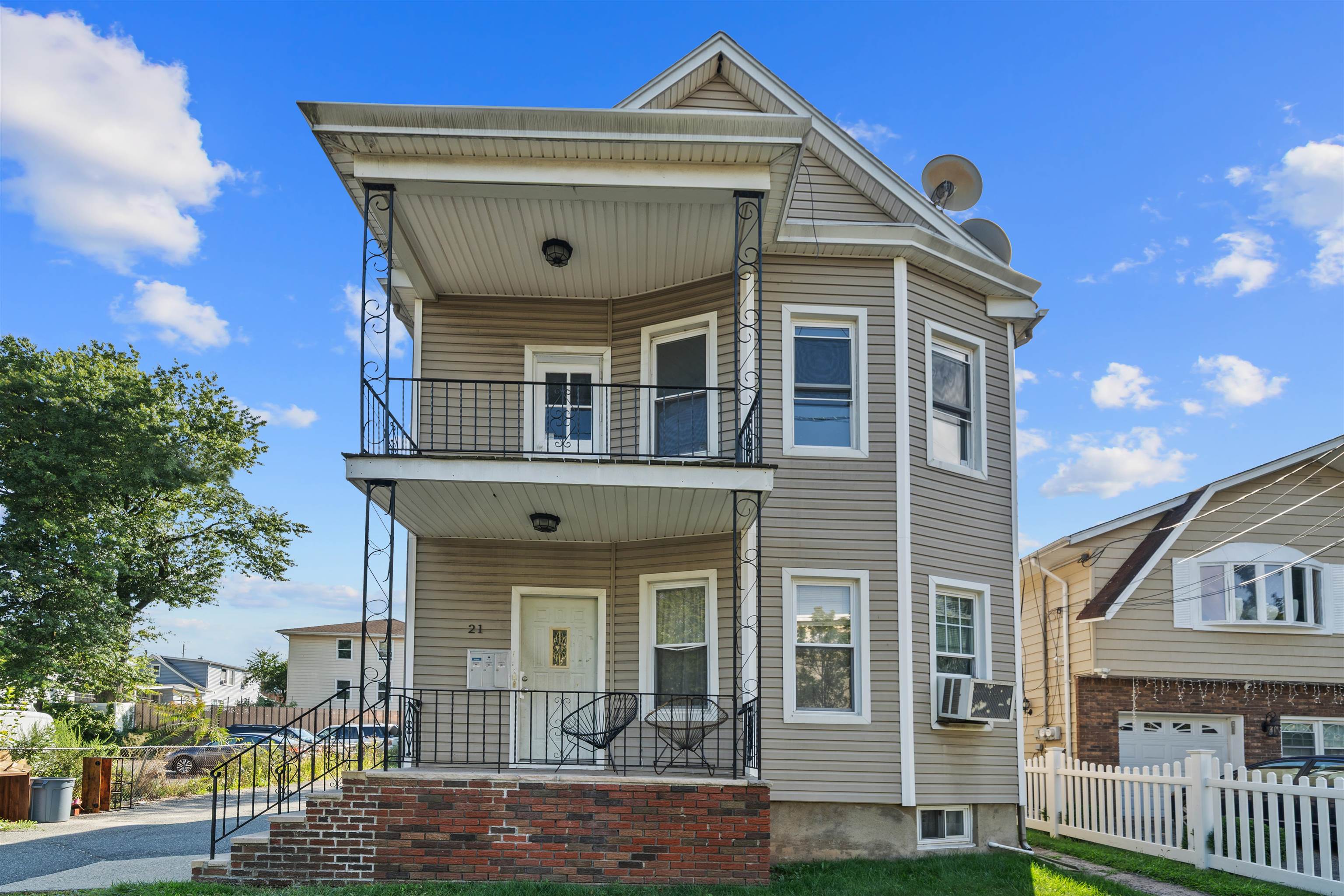 a front view of a house with a porch