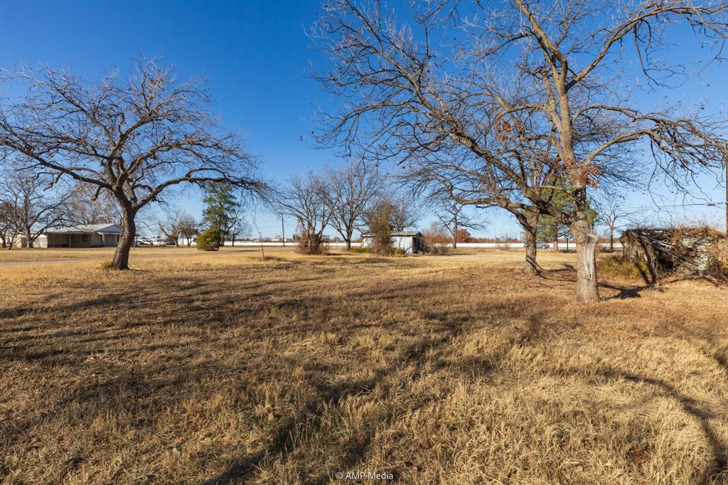 309 South Access Road Clyde, TX 79510 - Photo 5 of 9 a view of yard with trees