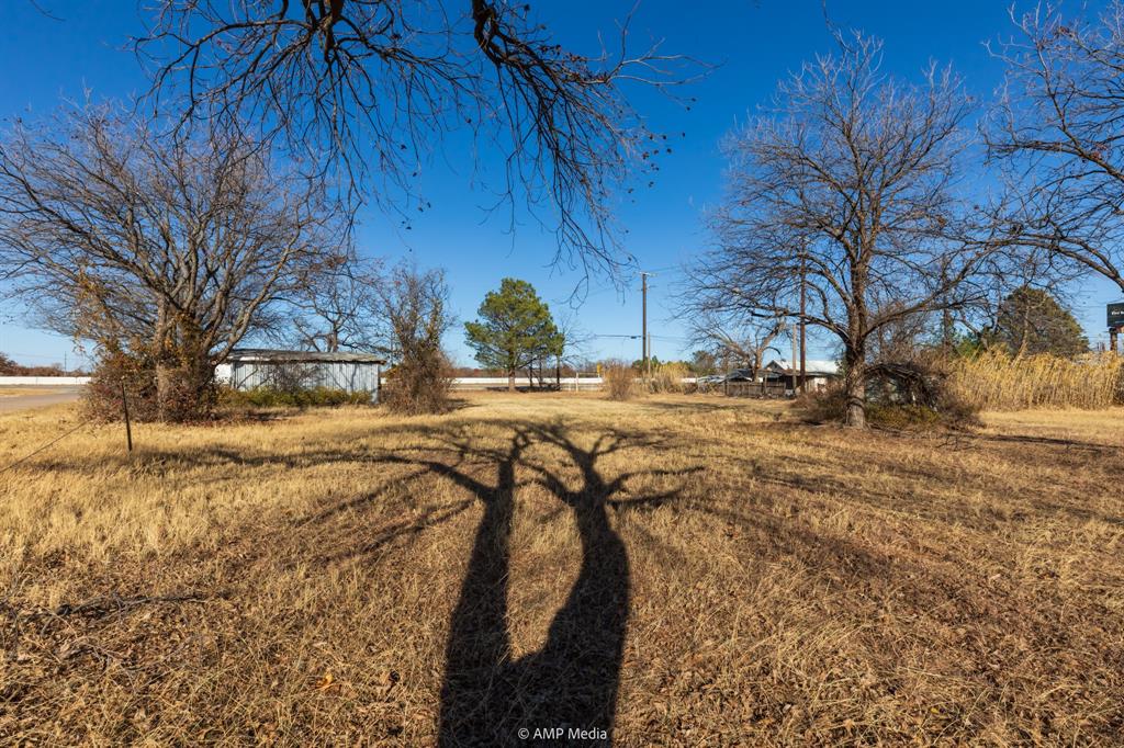 309 South Access Road Clyde, TX 79510 - Photo 6 of 9 a view of yard with wooden fence