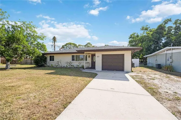 front view of a house with a patio