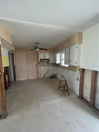 a view of kitchen and sink