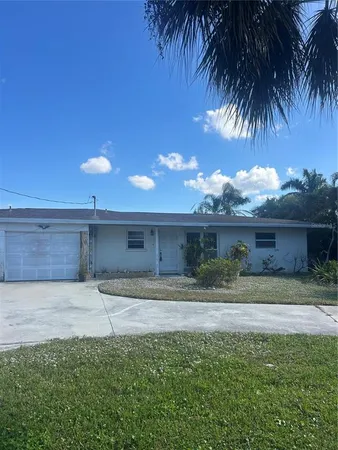 a view of a yard in front of a house