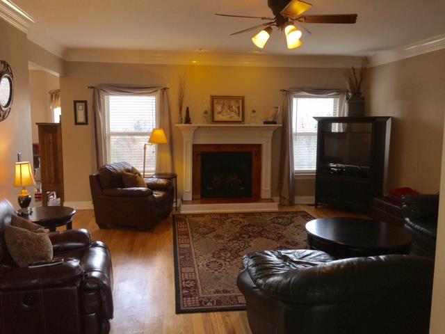 7352 Overbey Road Fairview, TN 37062 - Photo 10 of 21 Living Room and fireplace! Nice Hardwood Floors.