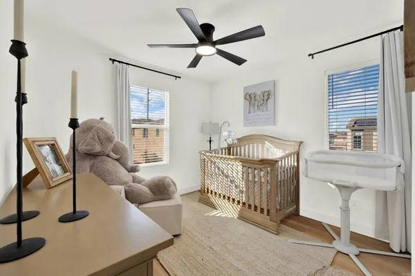 a bedroom with furniture and a window