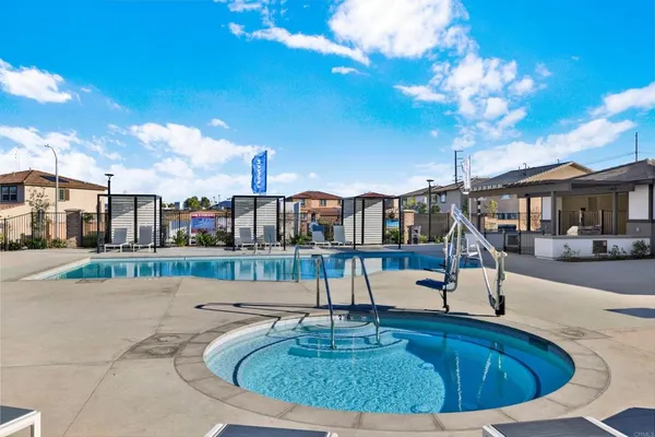 a view of swimming pool with outdoor seating