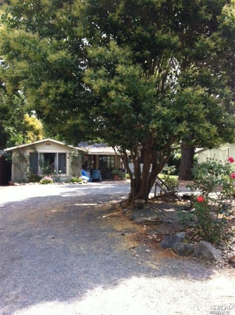 1572 Beaver Street Santa Rosa, CA 95404 - Photo 1 of 1 a front view of a house with a yard