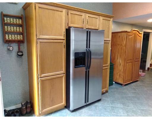 230 Wheelwright Road Barre, MA 01005 - Photo 8 of 14 a metallic refrigerator freezer sitting in a kitchen