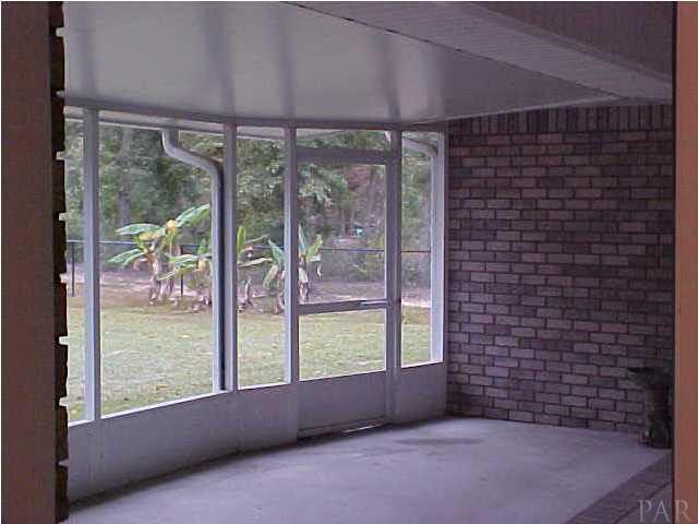 4535 South Spencer Field Road Pace, FL 32571 - Photo 16 of 22 Screened Porch