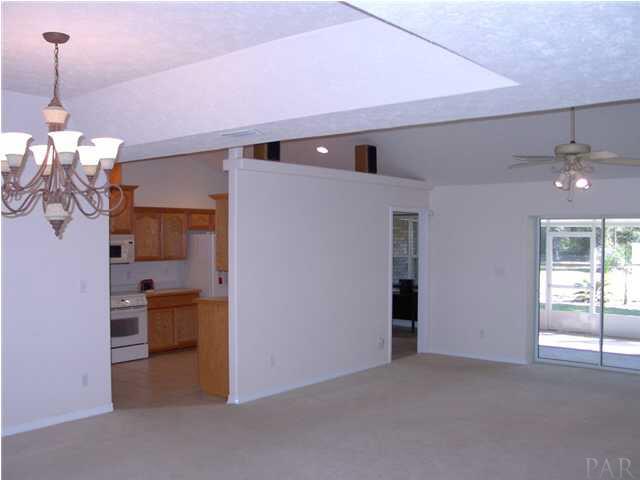 4535 South Spencer Field Road Pace, FL 32571 - Photo 17 of 22 Living room going into kitchen