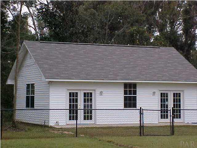 4535 South Spencer Field Road Pace, FL 32571 - Photo 8 of 22 Close up of workshop