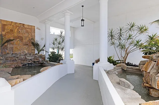 a view of entryway with a front door