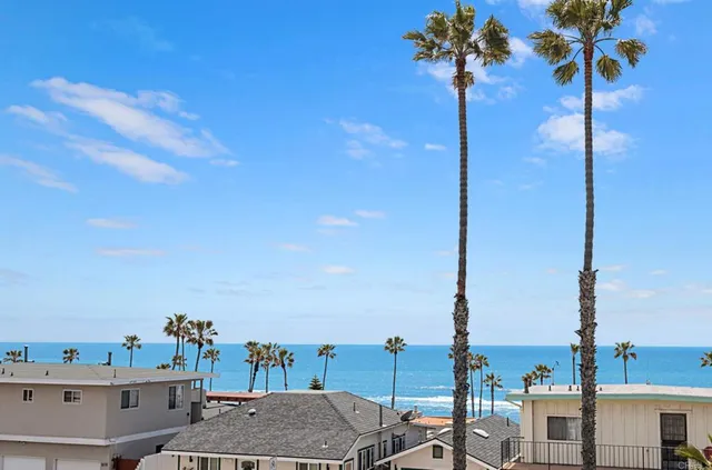 a view of a city with tall buildings