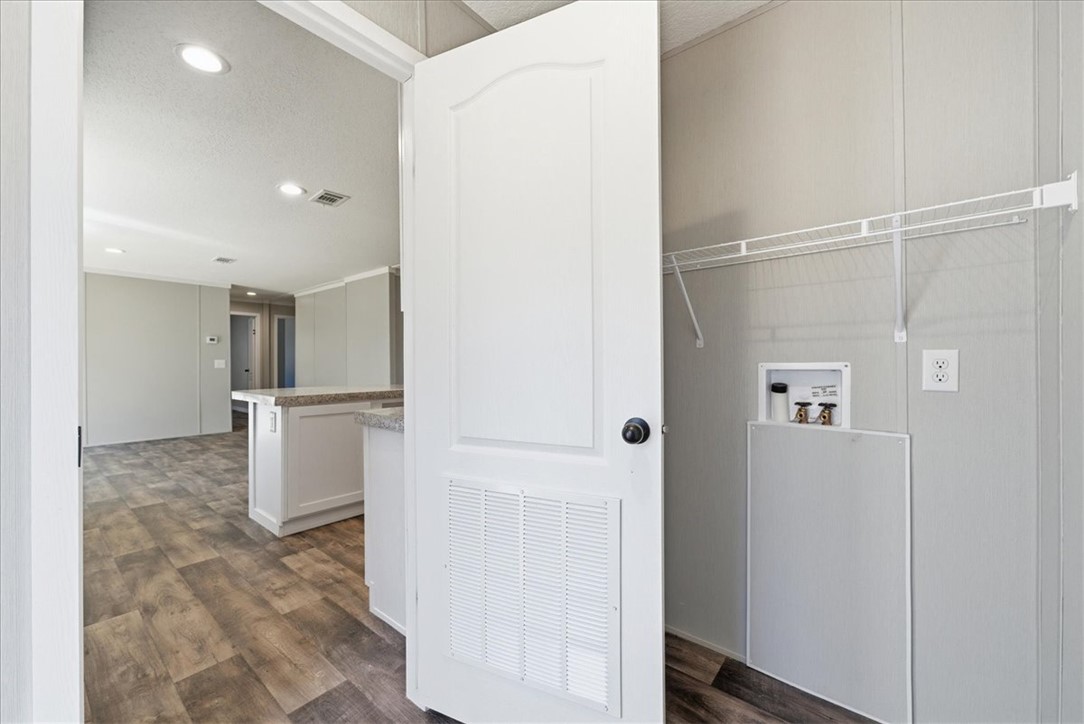 205 Union Court West Union, SC 29696 - Photo 14 of 28 This functional laundry area is conveniently located, offering ease and practicality for daily routines.
