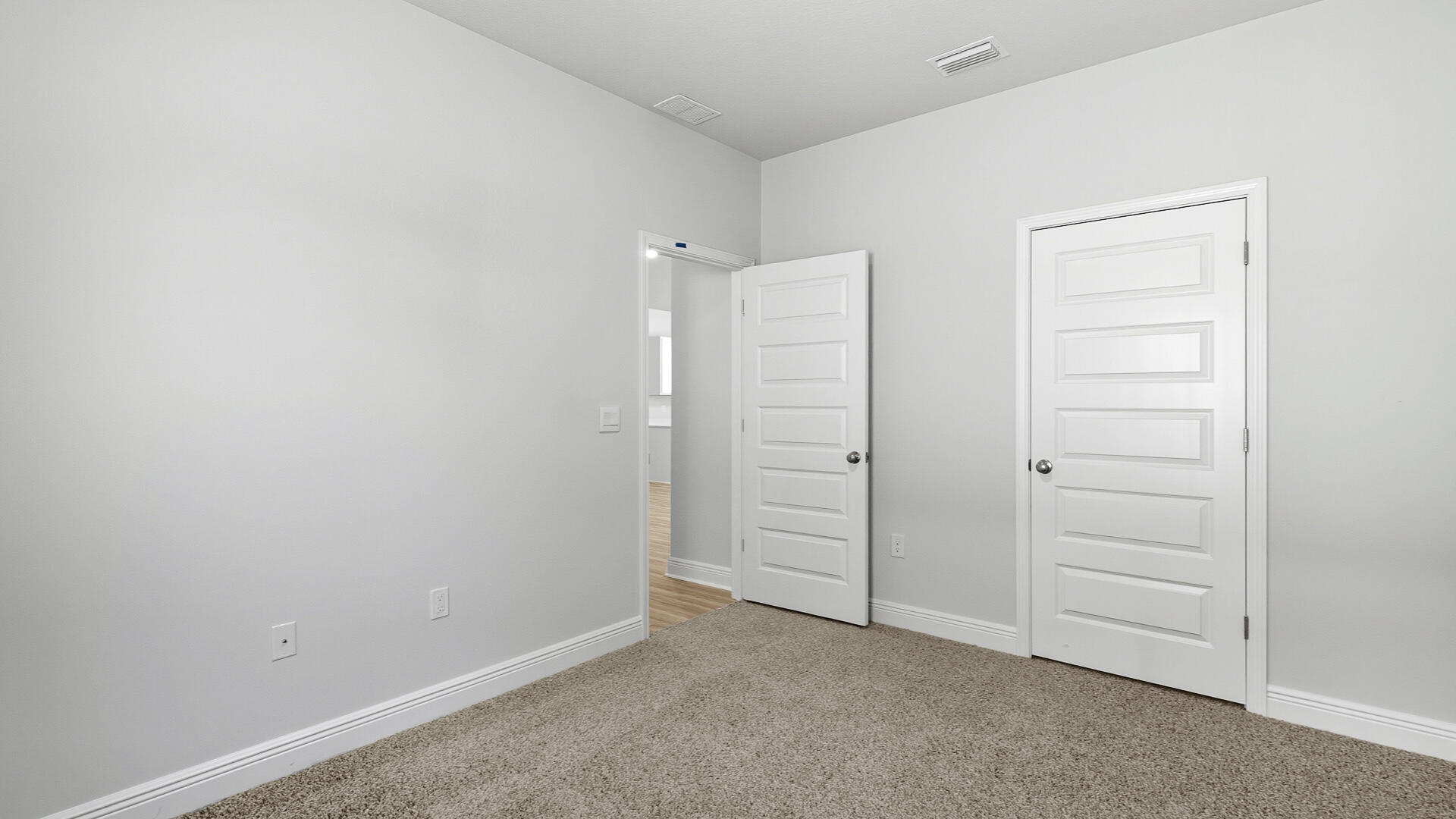 8682 Bluebell Street Milton, FL 32583 - Photo 25 of 28 an empty room with closet area