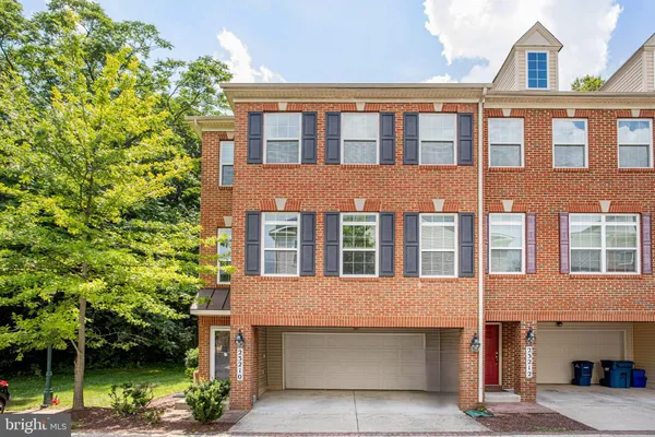 a front view of a building with garden