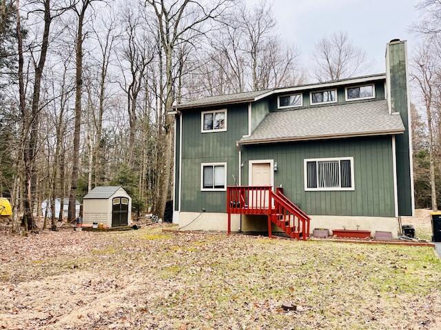 412 Tranquility Trail Long Pond, PA 18334 - Photo 2 of 8 a front view of a house with a yard