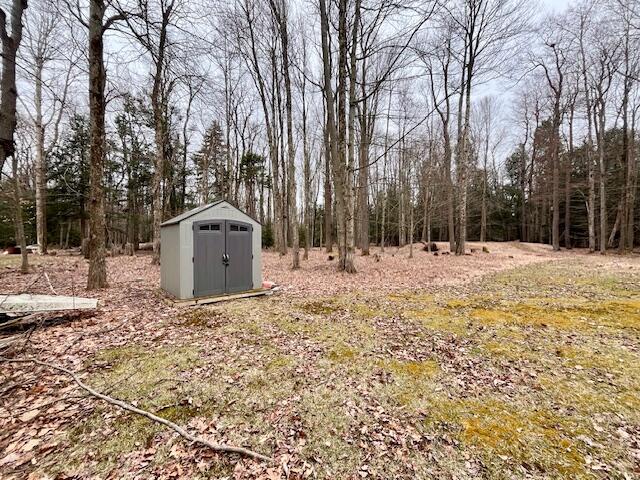 412 Tranquility Trail Long Pond, PA 18334 - Photo 7 of 8 a street view covered with snow