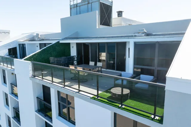 a view of a city with tall buildings