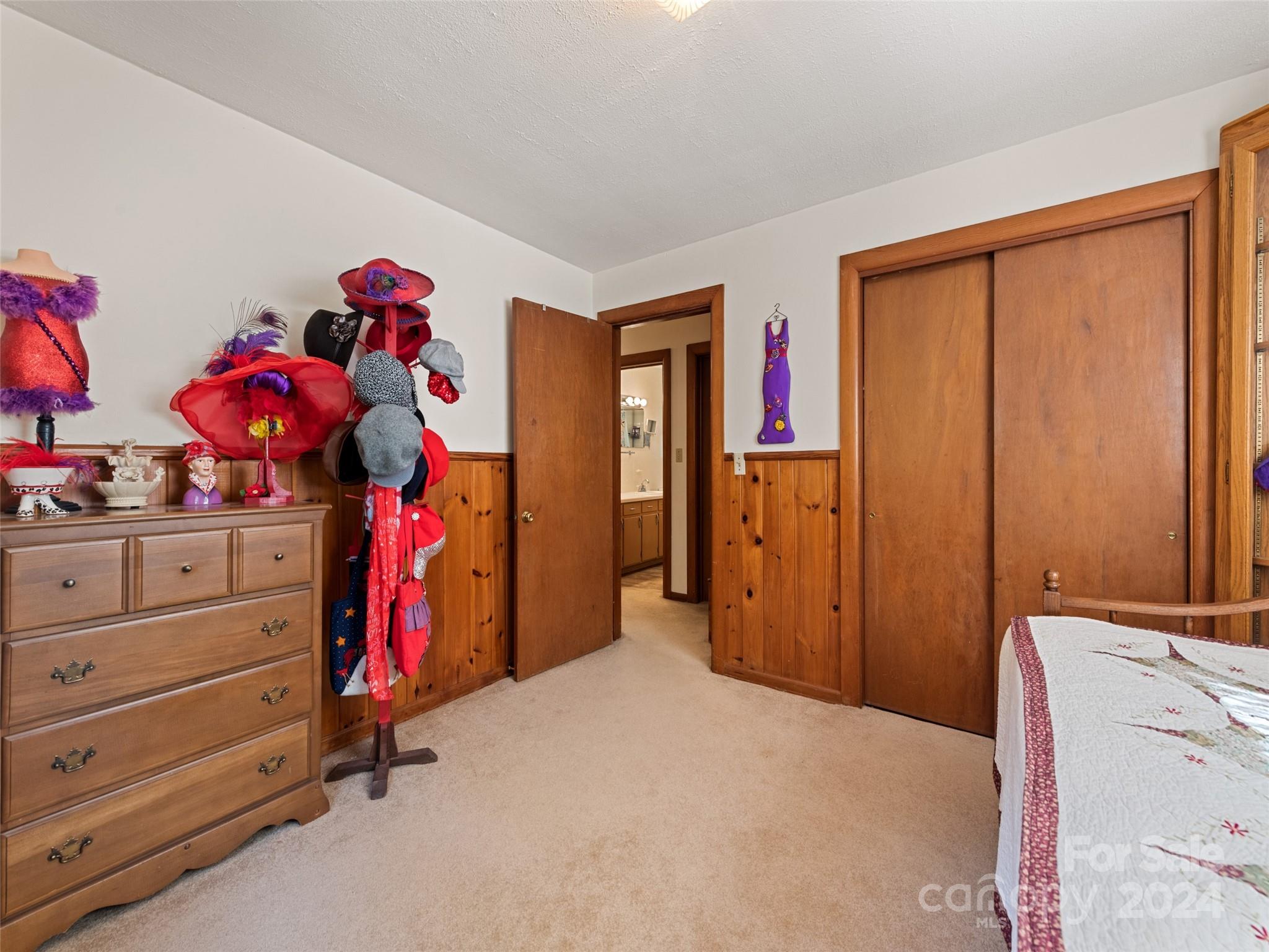 262 Bunny Run Road Canton, NC 28716 - Photo 41 of 45 a bedroom with a bed and a window