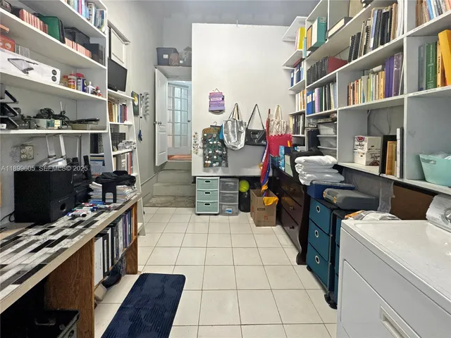 a kitchen with a stove and a refrigerator