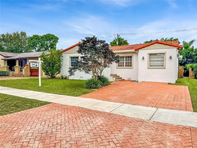 a view of outdoor space yard and front view of a house