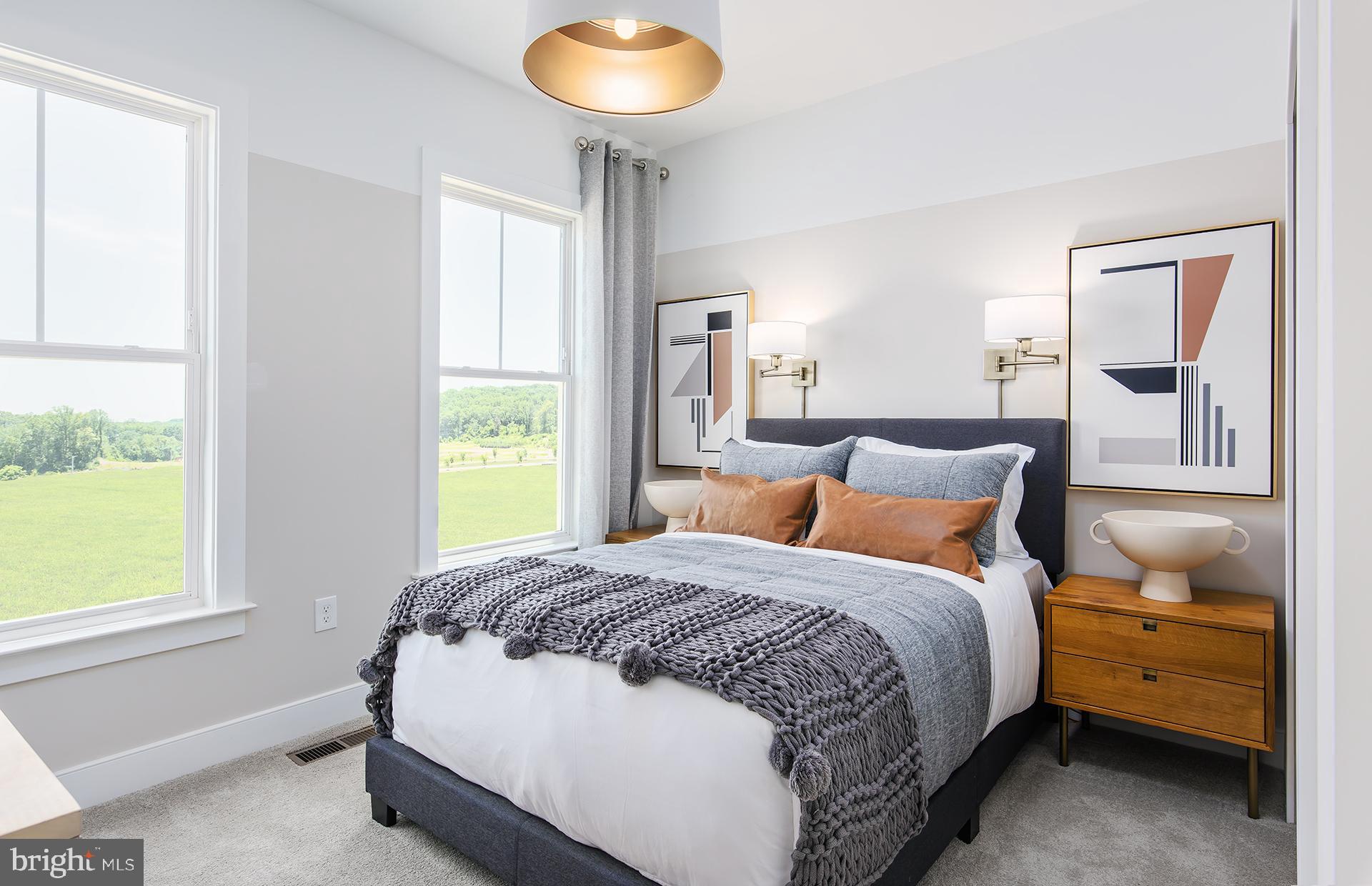 303 Backwater Way Laurel, MD 20724 - Photo 13 of 33 a bedroom with a bed and a window