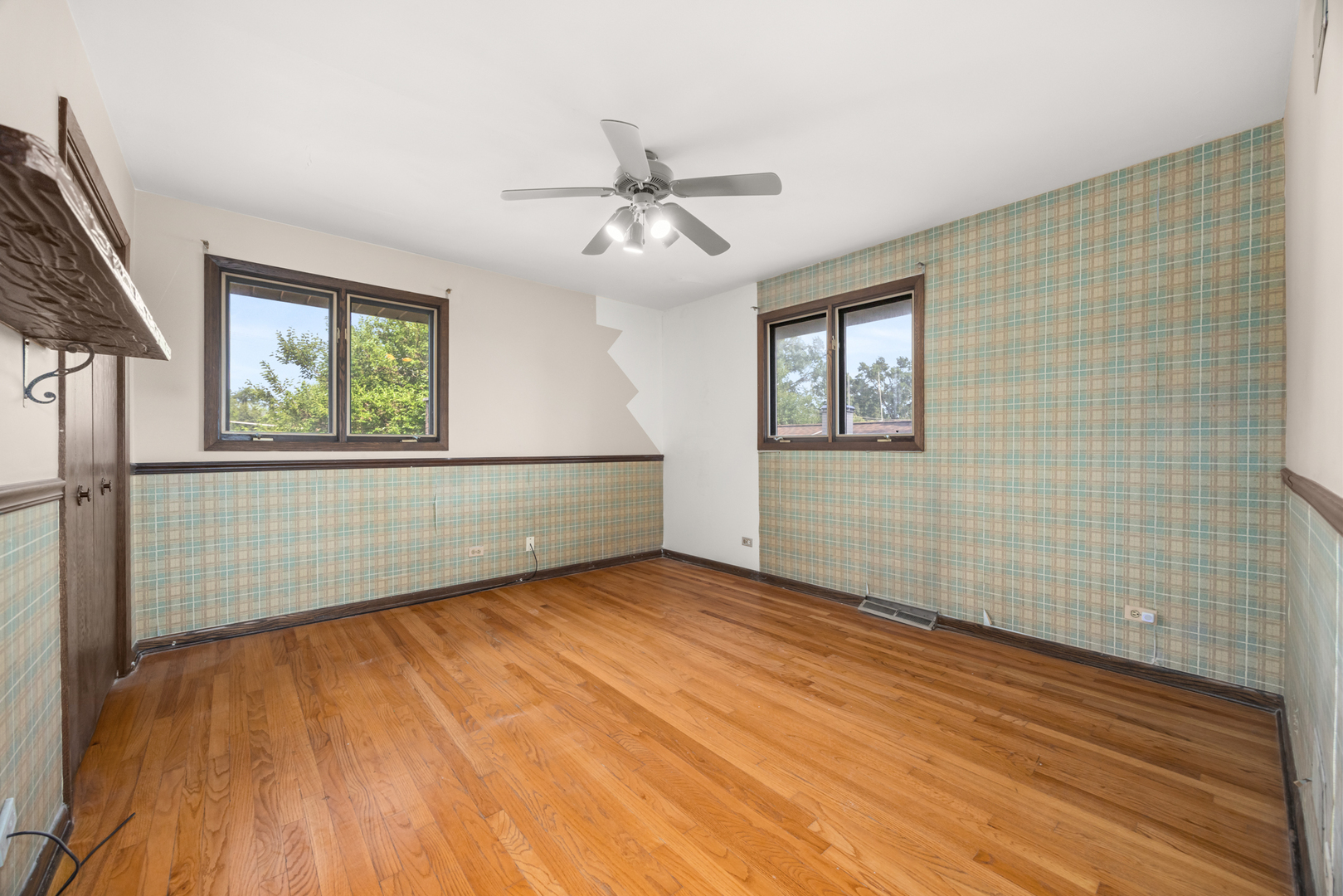 18309 Bock Road Lansing, IL 60438 - Photo 19 of 28 wooden floor in an empty room with a window