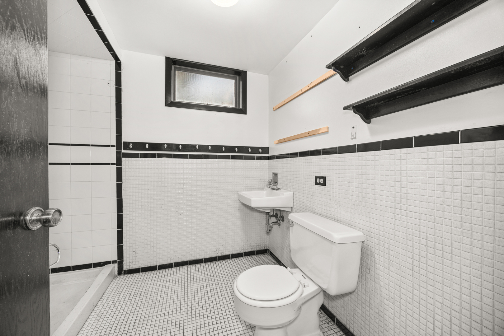 18309 Bock Road Lansing, IL 60438 - Photo 24 of 28 a white toilet sitting next to a bathroom sink