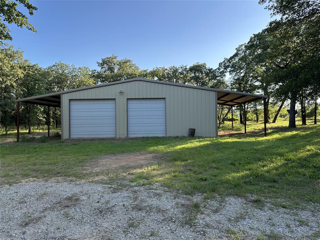 1625 Sanger Drive Springtown, TX 76082 - Photo 21 of 40 Front side of shop.