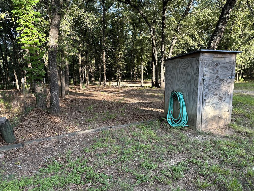 1625 Sanger Drive Springtown, TX 76082 - Photo 26 of 40 Well head and pressure tank are located inside this pump house.