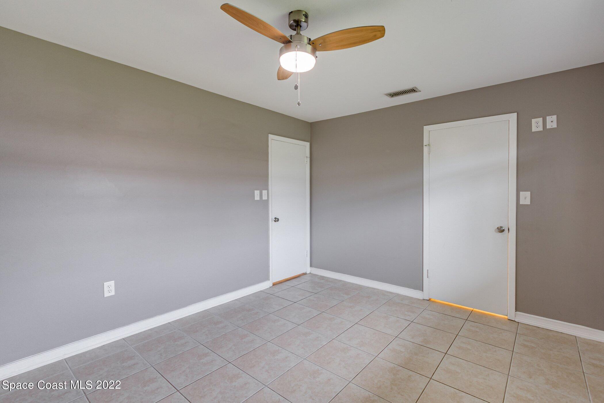 714 Catalina Road, Unit 9 Cocoa Beach, FL 32931 - Photo 17 of 33 a view of an empty room