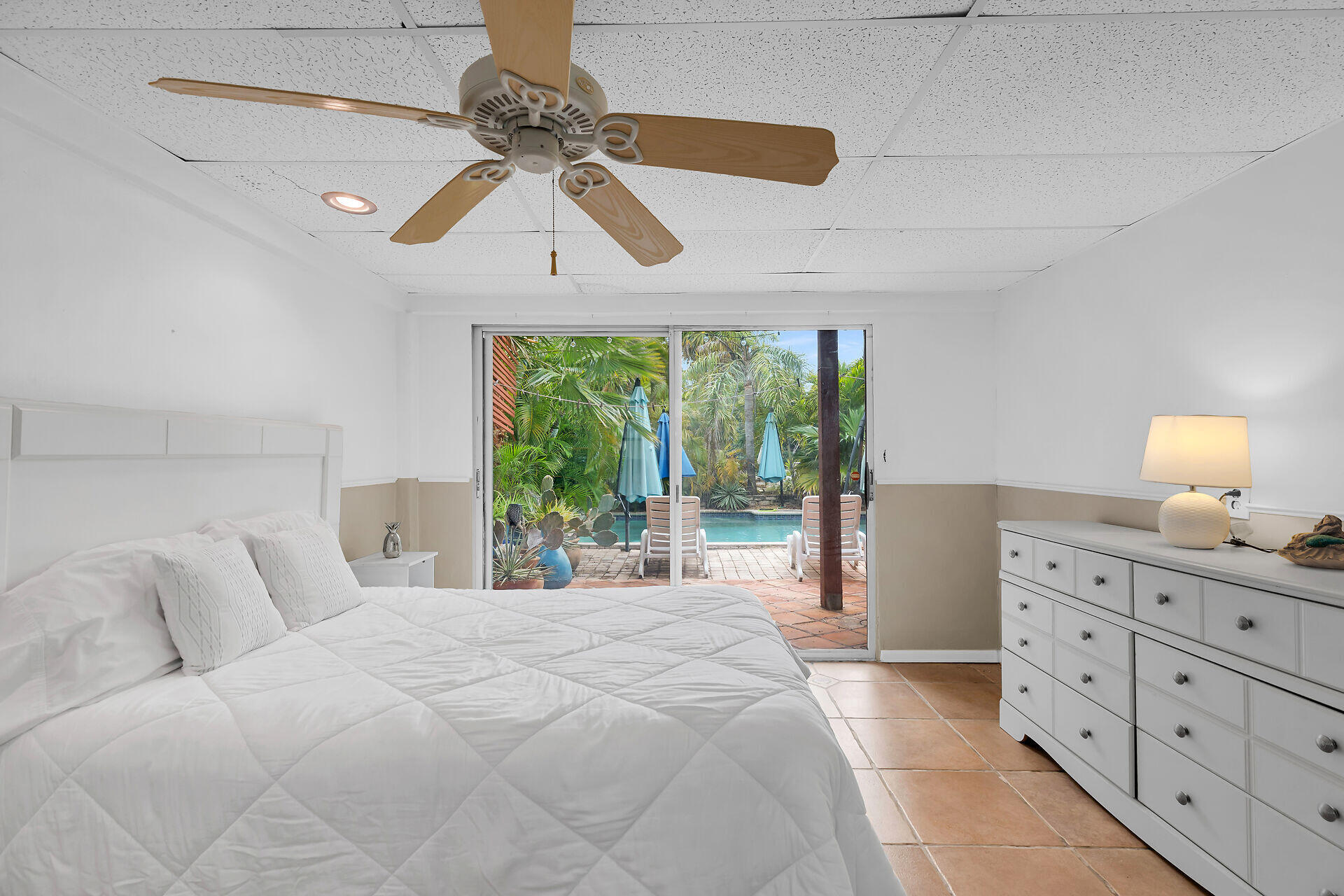 42 Treasure Road Marathon, FL 33050 - Photo 33 of 70 a bedroom with a large bed and a window