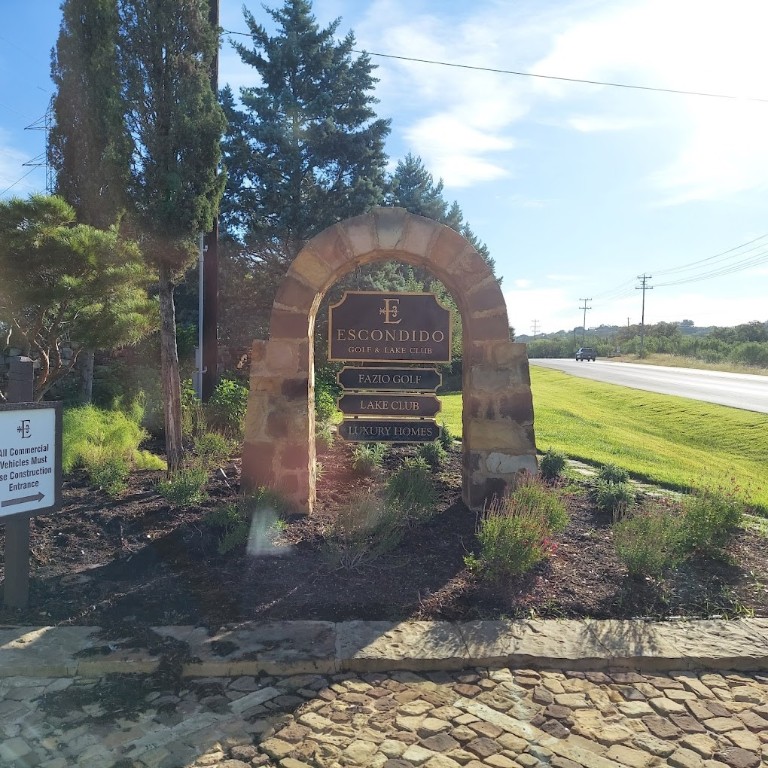 1221 Apache Tears Horseshoe Bay, TX 78657 - Photo 20 of 20 a view of a yard in front of the house