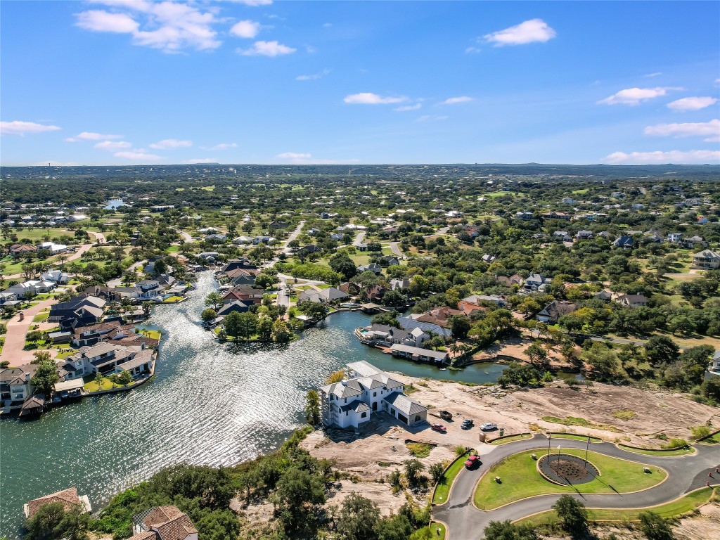 1221 Apache Tears Horseshoe Bay, TX 78657 - Photo 5 of 20 an aerial view of residential houses with outdoor space and lake view in back