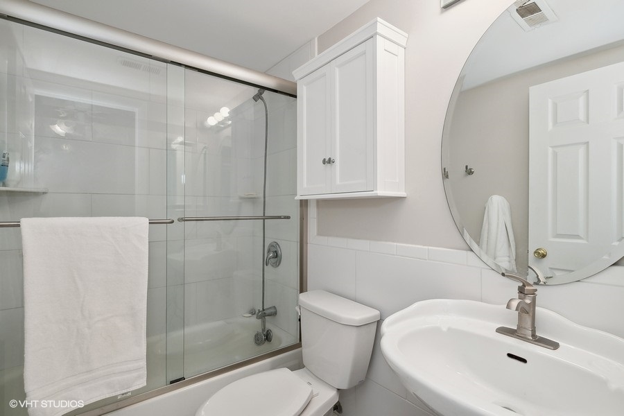 103 Viola Court Rolling Meadows, IL 60008 - Photo 18 of 27 a bathroom with a sink toilet and shower