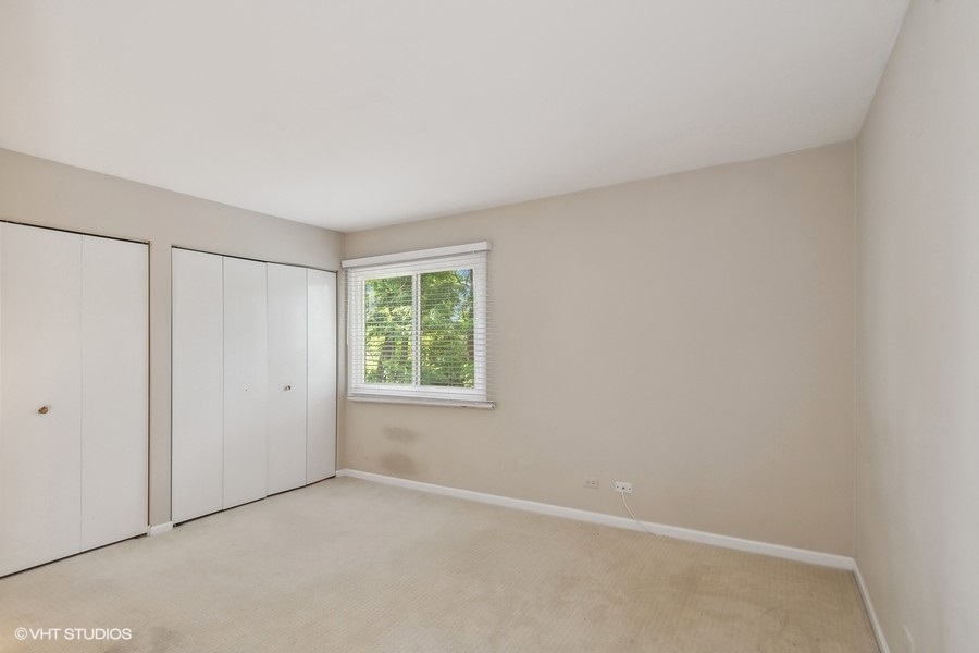 103 Viola Court Rolling Meadows, IL 60008 - Photo 19 of 27 a view of an empty room with a window