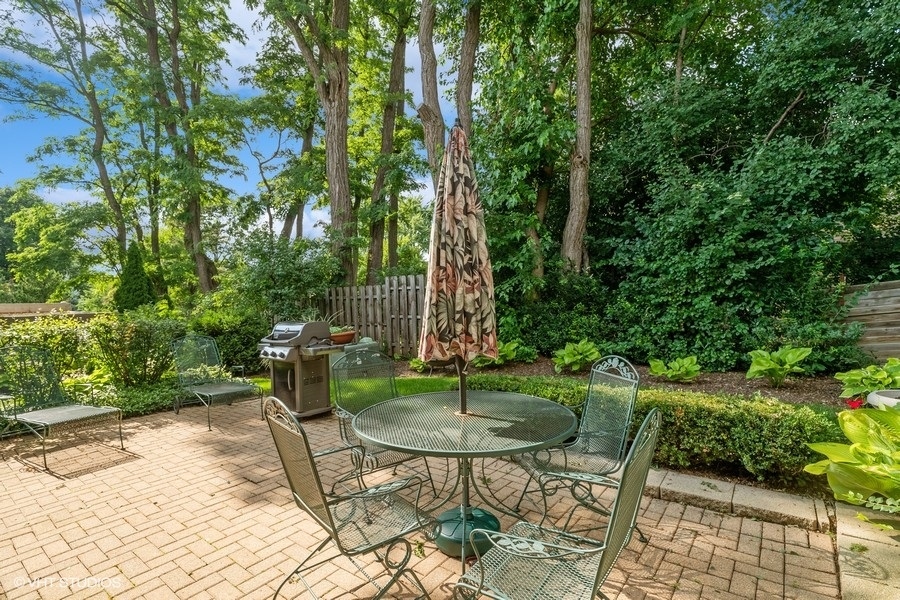 103 Viola Court Rolling Meadows, IL 60008 - Photo 21 of 27 a garden view with a seating space