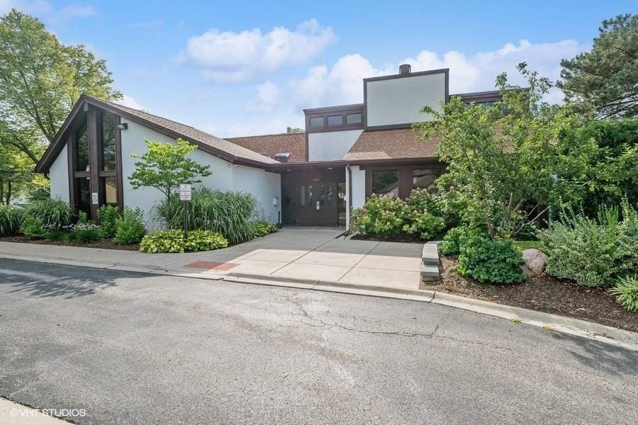 103 Viola Court Rolling Meadows, IL 60008 - Photo 23 of 27 front view of a house with a yard