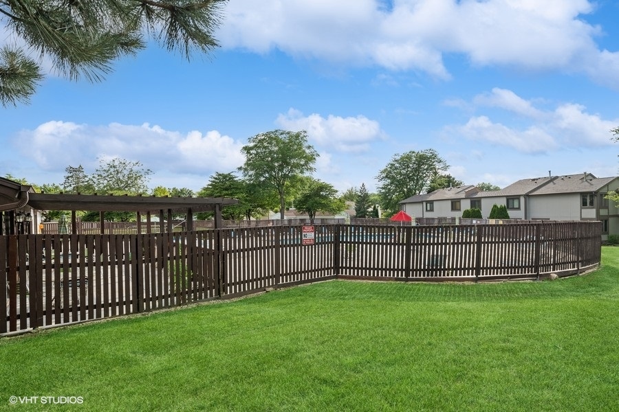 103 Viola Court Rolling Meadows, IL 60008 - Photo 24 of 27 a view of a yard with a garden