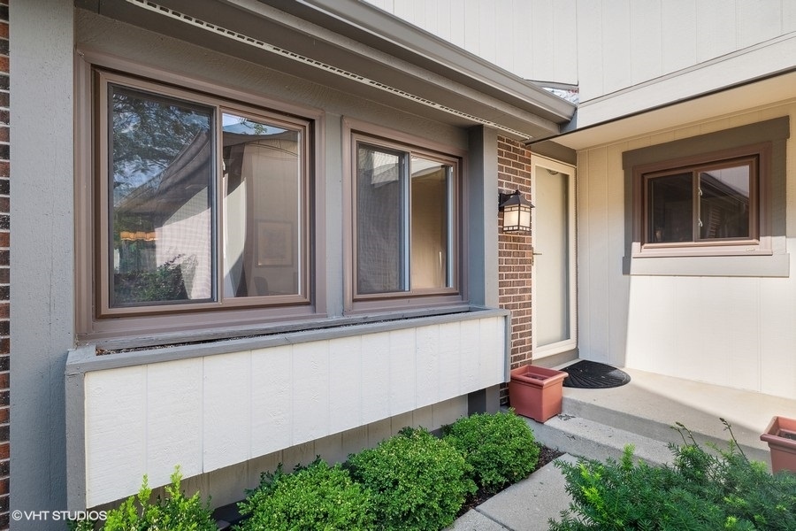 103 Viola Court Rolling Meadows, IL 60008 - Photo 3 of 27 a front view of a house with a yard