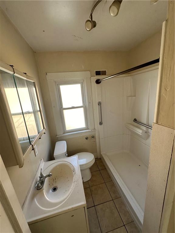 1616 3rd Avenue Arnold, PA 15068 - Photo 13 of 18 a bathroom with a sink toilet and shower